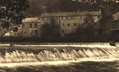 Old linen mill and weir. Image from an old postcard kindly lent by Pat Wood